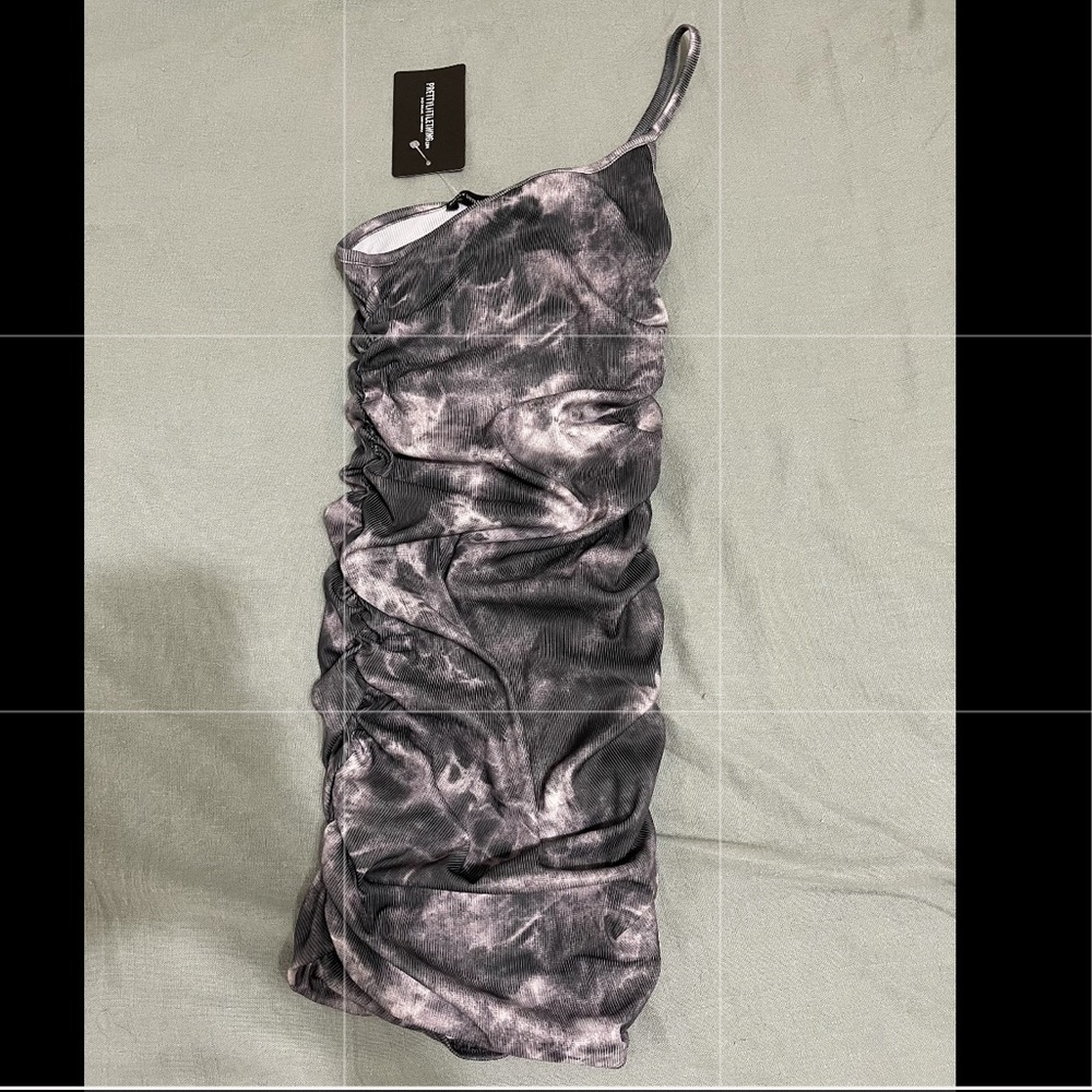 Black and white one shoulder mini dress